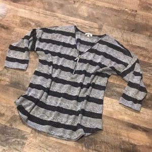 Black and gray stripped shirt with zipper
